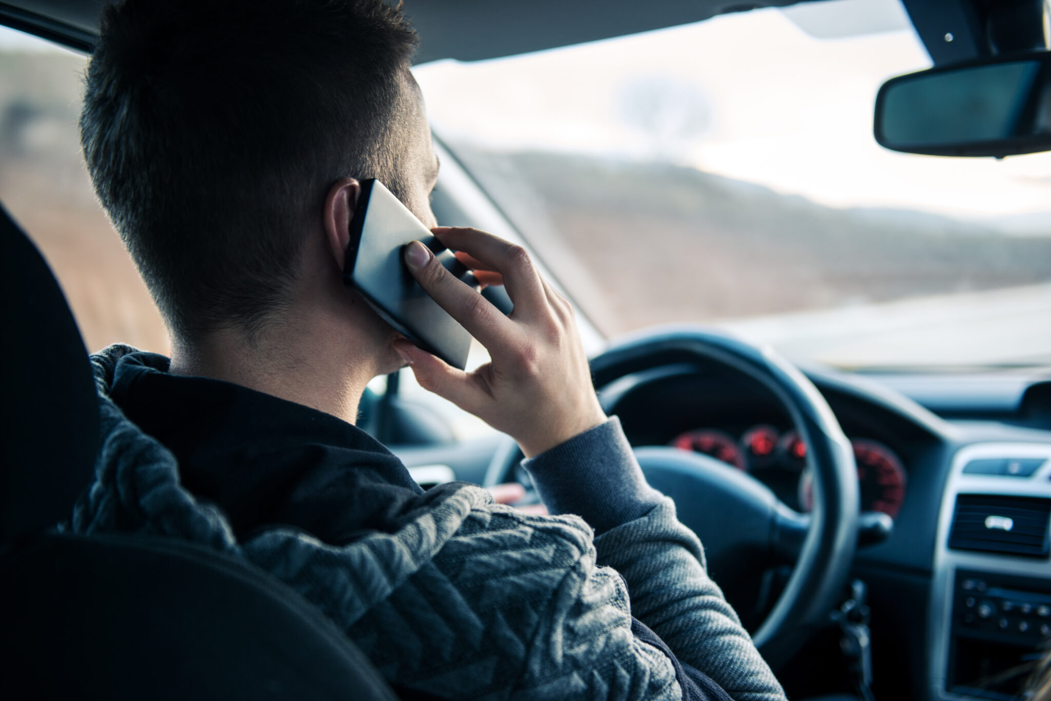 talking on the phone wile driving in Austin, Texas